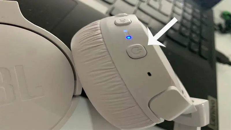 Put headphones into pairing mode